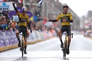 WEVELGEM BELGIUM MARCH 26 LR Wout Van Aert of Belgium and race winner Christophe Laporte of France and Team JumboVisma celebrate at finish line as race winner during the 85th GentWevelgem in Flanders Fields 2023 Mens Elite a 2609km one day race from Ypres to Wevelgem UCIWT on March 26 2023 in Wevelgem Belgium Photo by Tim de WaeleGetty Images
