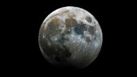 A high definition image of a full moon during a partial lunar eclipse.