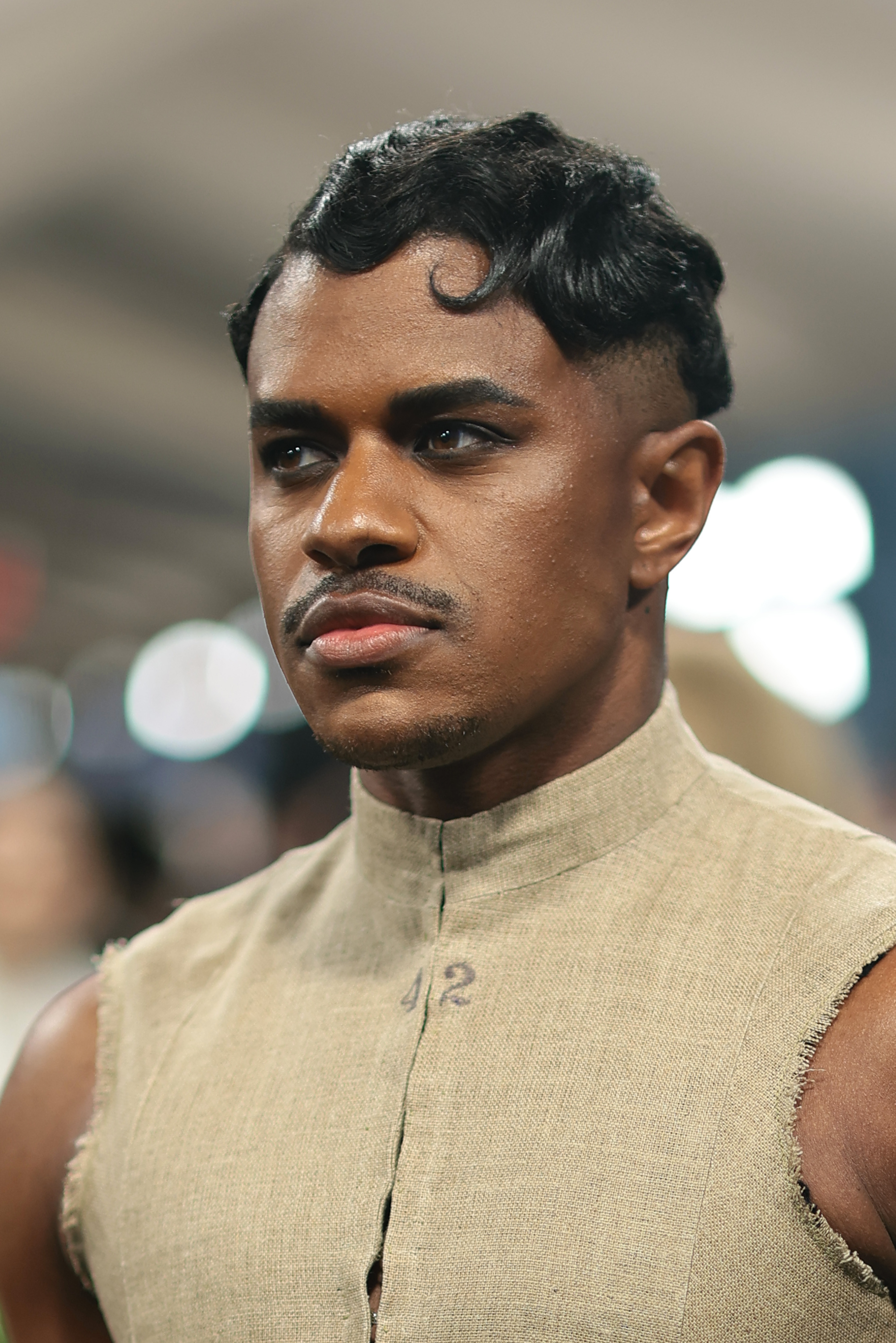 Jeremy Pope in kiss curl finger waves