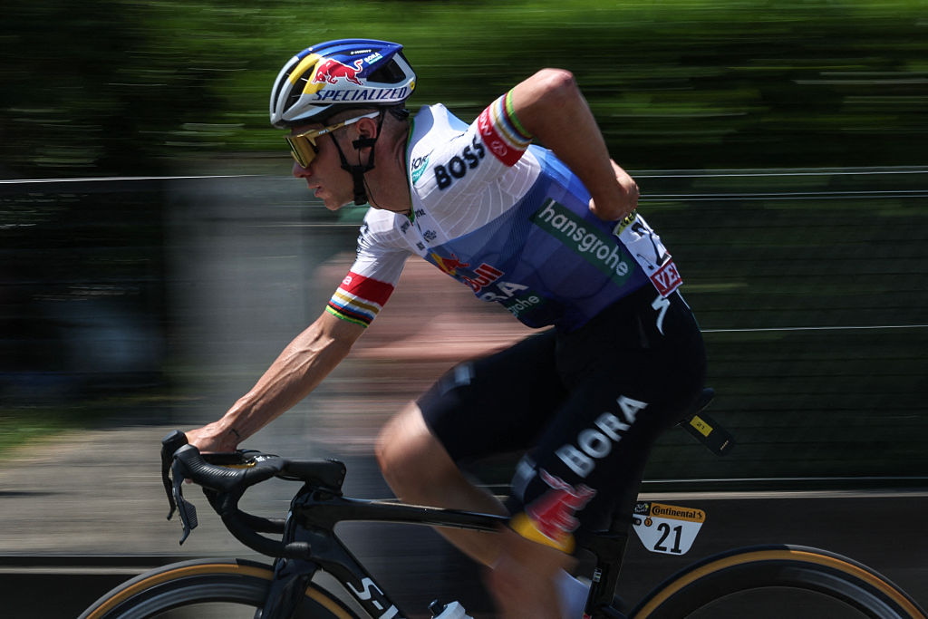 Red Bull - BORA - hansgrohe team's Belgian rider Remco Evenepoel cycles during the 6th stage of the 113th edition of the Tour de France cycling race, 186,2 km between Pau and Gavarnie-G&amp;egrave;dre in the French Pyrenees, on July 9, 2026. (Photo by Anne-Christine POUJOULAT / AFP)