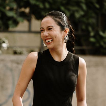 woman wearing a black tank top
