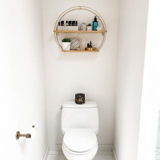 White toilet in downstairs bathroom