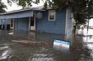Rain from Hurricane Harvey inundates the Cottage Grove neighborhood on Aug. 27 in Houston, Texas.