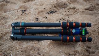 3 Legged Thing Punks Brian Tripod on a beach