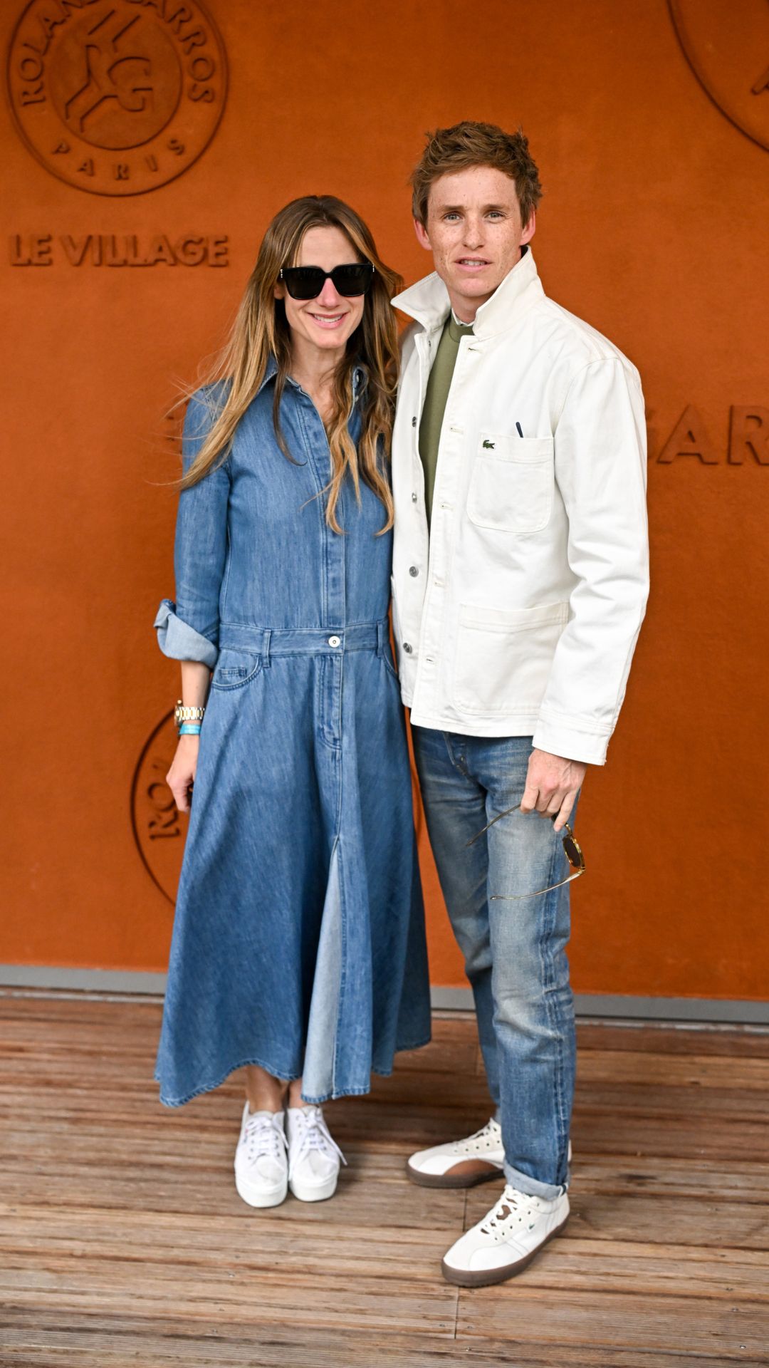 Hannah Bagshawe and Eddie Redmayne attend the 2025 French Open at Roland Garros