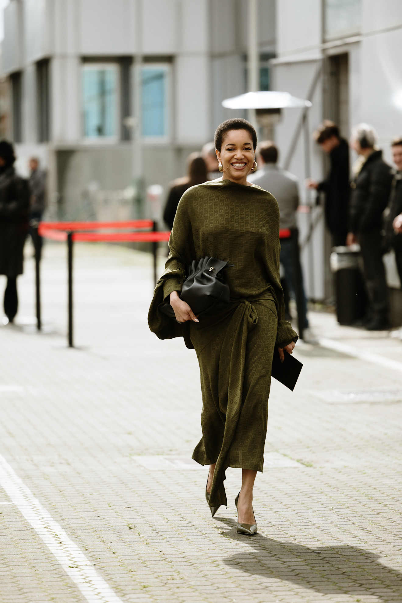 woman wearing olive green high-neck dress