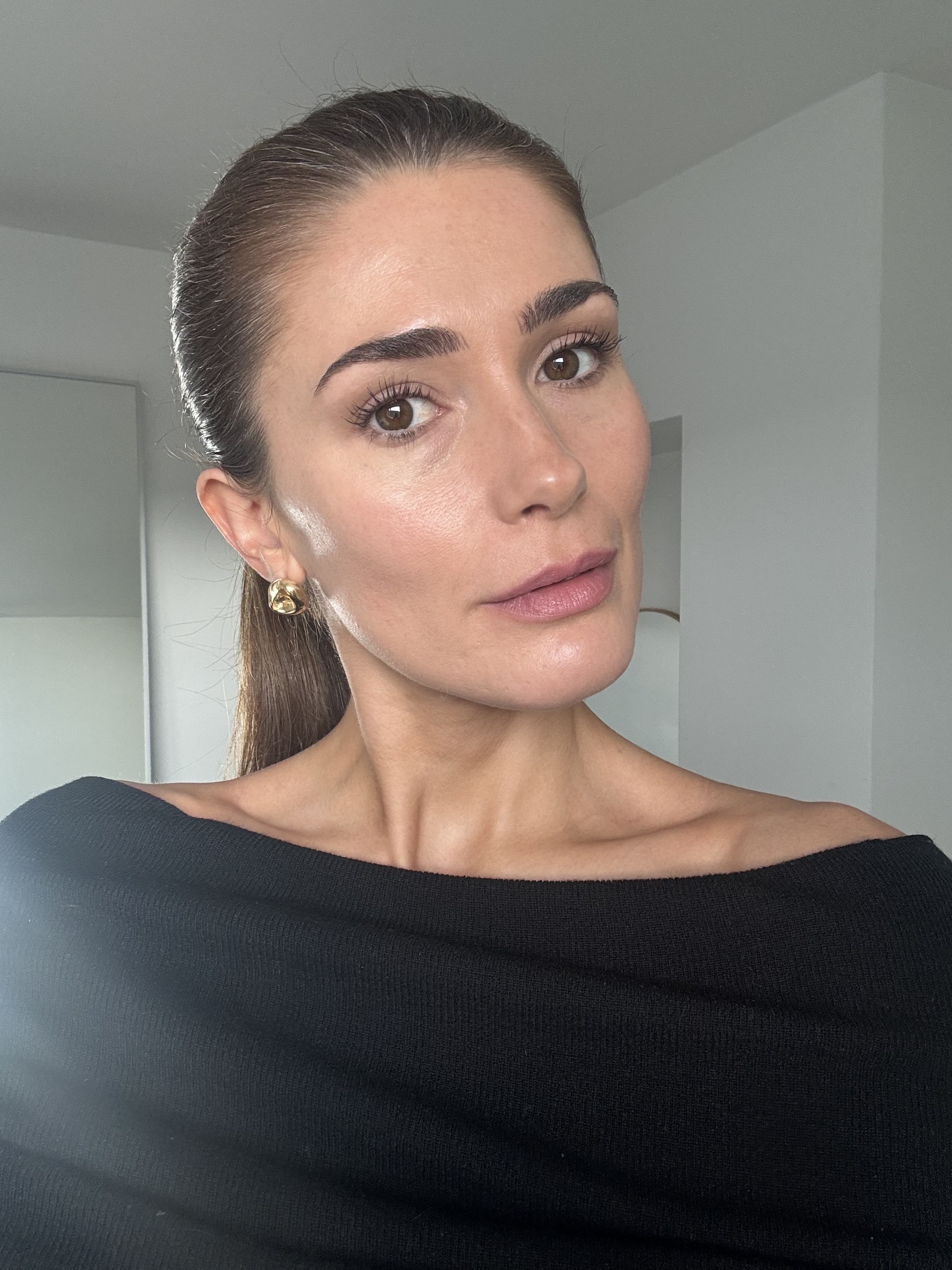 A photo of Eleanor wearing the Dior Forever Bronze stick