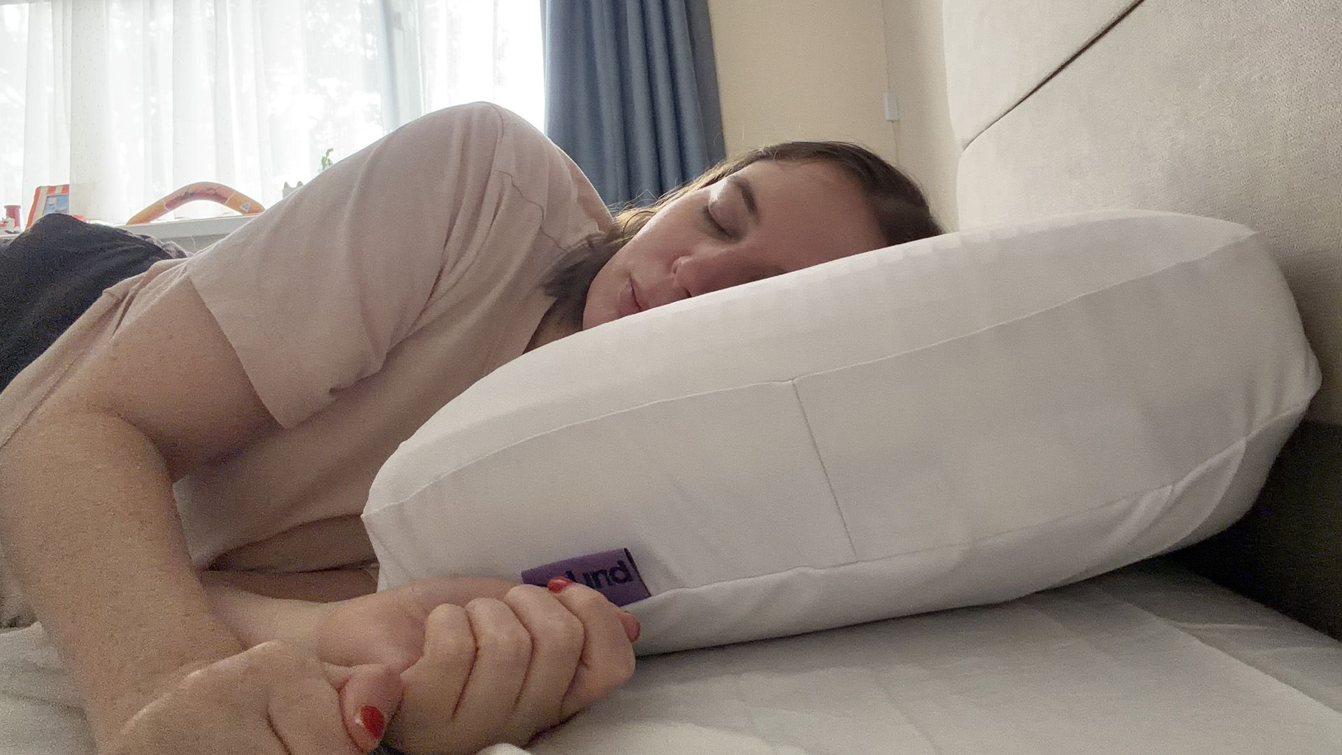 Tester Ruth Jones side sleepers on the DreamLayer pillow with both booster layers