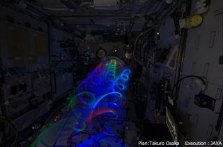 Astronaut Koichi Wakata tweeted this photo of the "Spiral Top" from aboard the International Space Station on Jan. 6, 2014. The toy uses LED lights to make art in zero-g conditions.