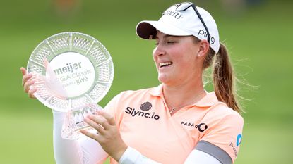 Jennifer Kupcho with the trophy after winning the 2022 Meijer LPGA Classic