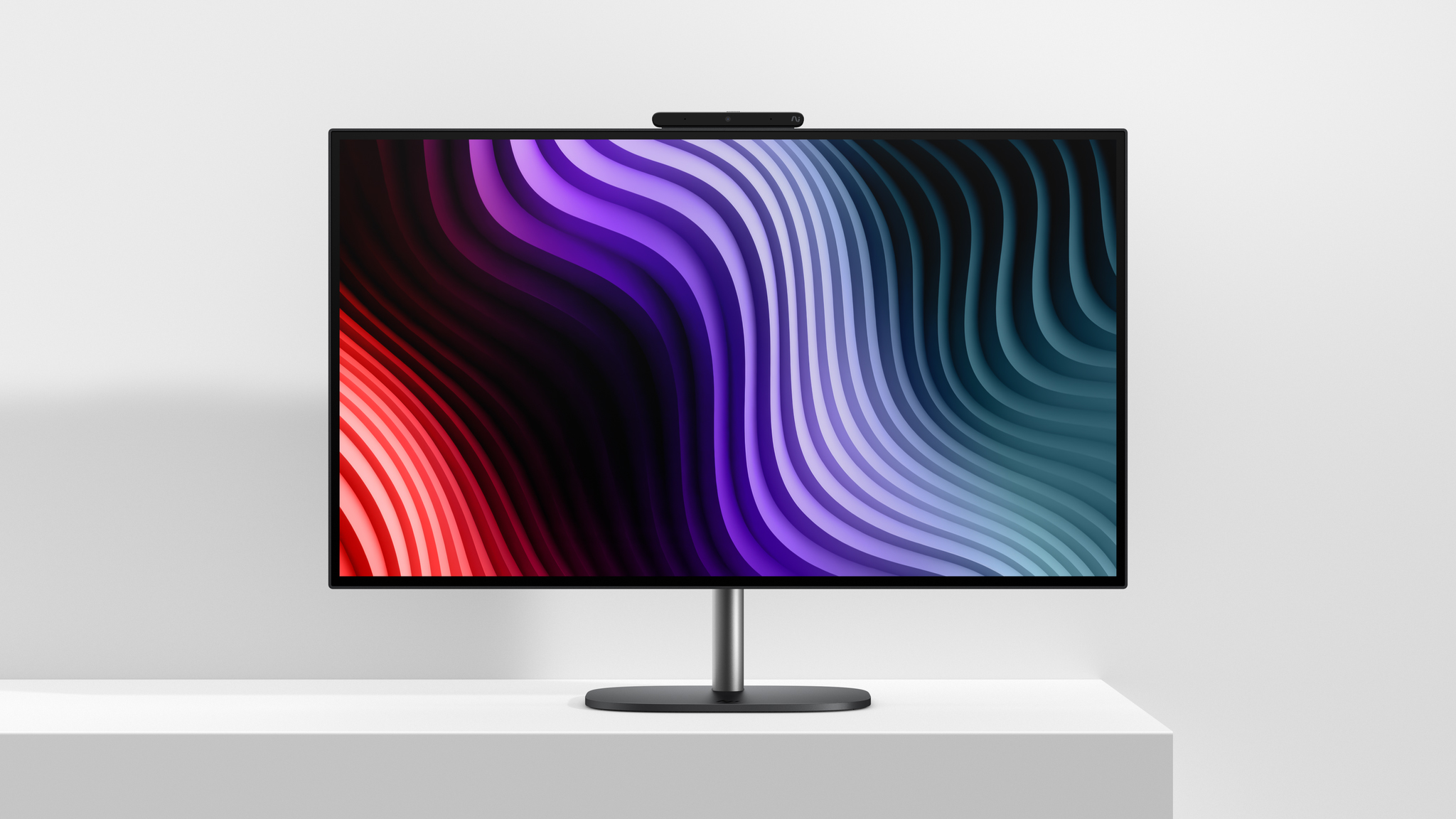 HP OmniStudio X 27-inch All-in-One Desktop on a white table.