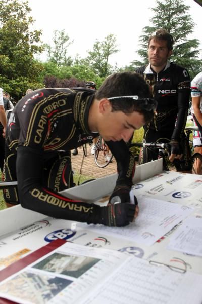 Antonio Pisoni and Daniele Ratto (Carmiooro-Ngc) sign in