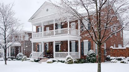 large house in the snow