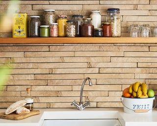 How to get rid of spiders - kitchen worktop counter with sink basin and tap - Unsplash