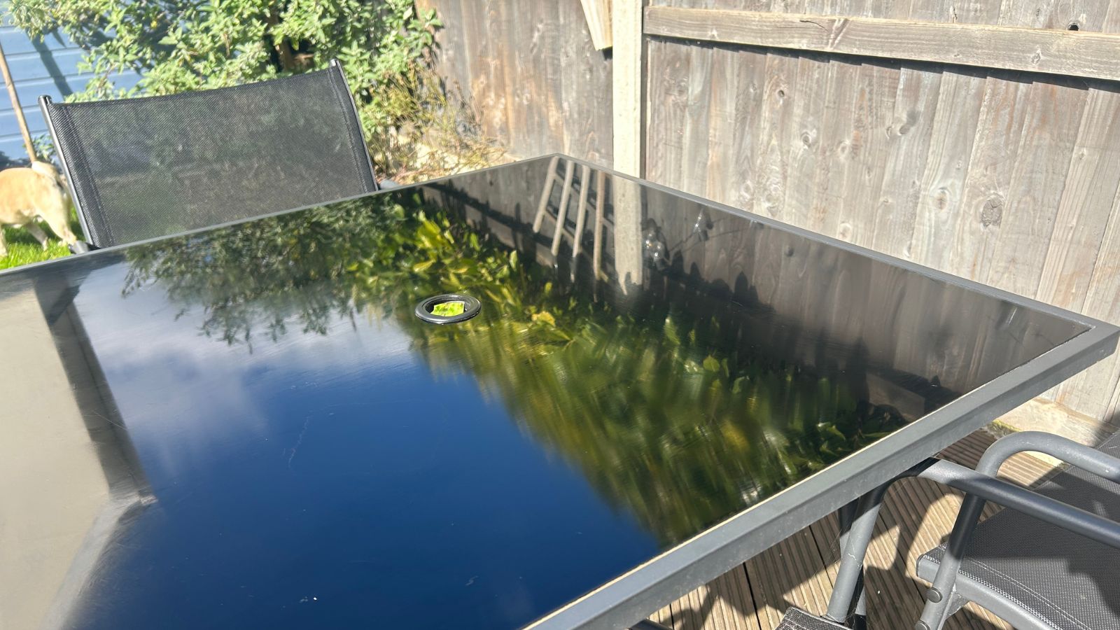 Black glass table after cleaning