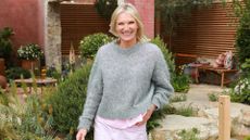 Jo Whiley walks through the Killik & Co 'Save for a Rainy Day' Garden at Chelsea Flower Show 