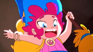 Mika and the Witch&#039;s Mountain trailer screenshot showing a cartoon-style young girl with bright red short hair and blue eyes falling while holding a broom in hand