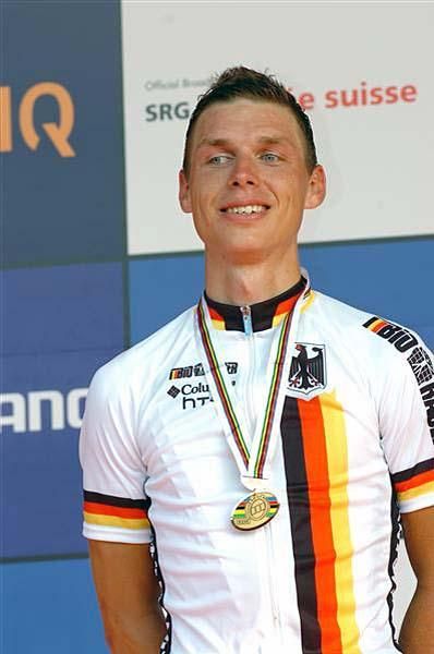 Tony Martin (Germany) smiles after receiving his medal.