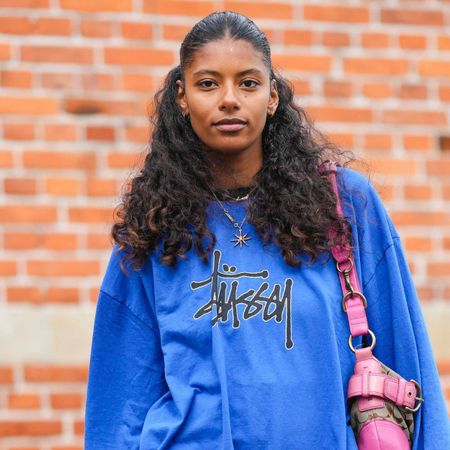 street style shot of woman with minimal makeup