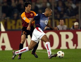 Thierry Henry of Arsenal in action during the UEFA Champions League Second Phase match between AS Roma and Arsenal, played at the Olympic Stadium, Rome, Italy on November 27, 2002.