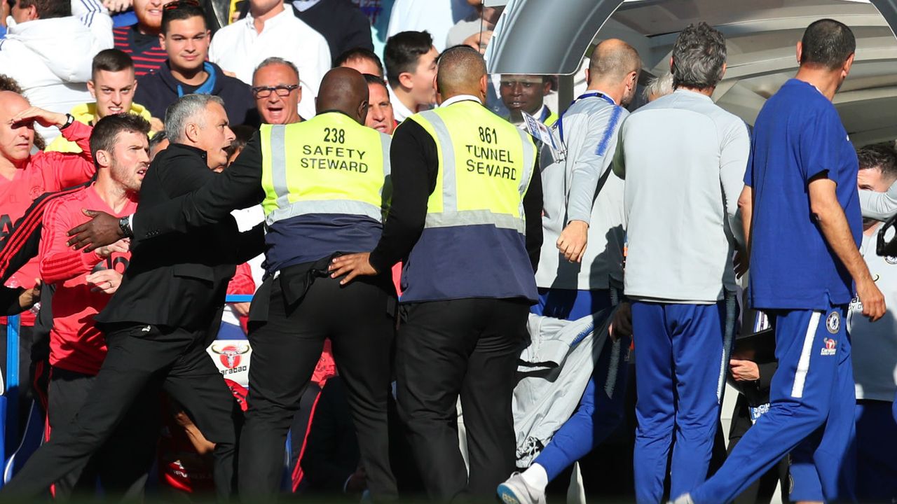 Stewards hold back Man Utd boss Jose Mourinho following Chelsea’s last-minute equaliser