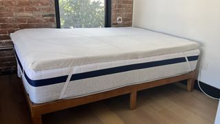 Tempur-Adapt Topper on a bed