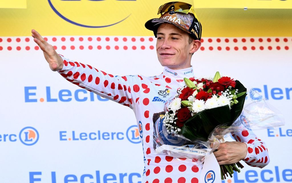JumboVisma teams Danish rider Jonas Vingegaard celebrates with the climbers dotted jersey on the podium after the 20th stage of the 109th edition of the Tour de France cycling race 407 km individual time trial between LacapelleMarival and Rocamadour in southwestern France on July 23 2022 Photo by Marco BERTORELLO AFP Photo by MARCO BERTORELLOAFP via Getty Images