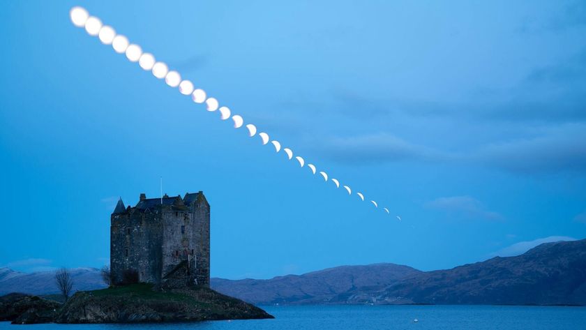 sequence of images of the lunar eclipse over a castle