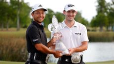 Xander Schauffele and Patrick Cantlay with the trophy after their win in the 2022 Zurich Classic of New Orleans