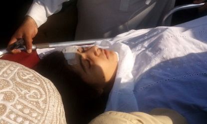 Malala Yousufzai, a 14-year-old Pakistani activist is moved to a helicopter to be taken to Peshawar for treatment, after being shot and wounded by a member of the Taliban on Oct. 9.