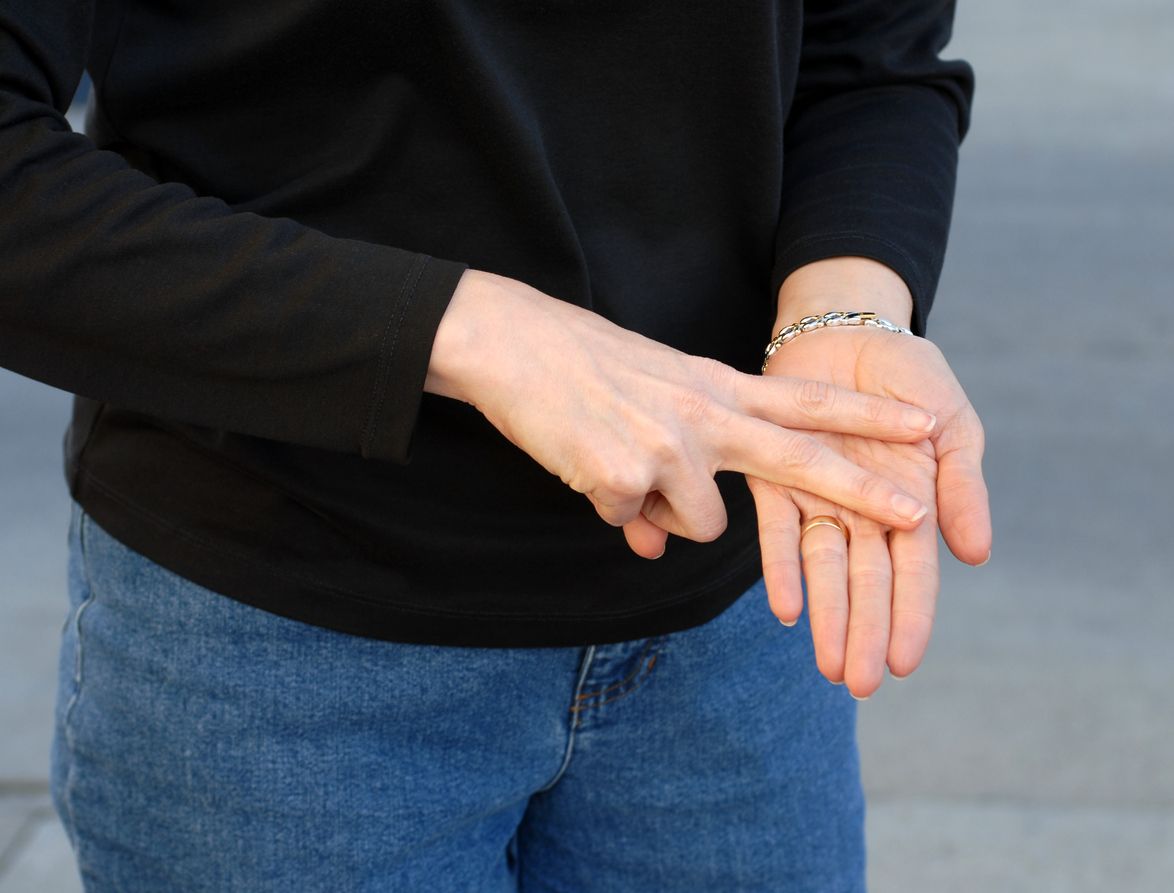 A person doing American Sign Language.