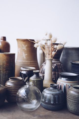 Angela Maynard's collection of jugs and vases for her dried flower arrangements