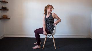 desk exercises: woman twisted on chair