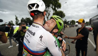 Mark Cavendish and Julian Alaphilippe celebrate victory