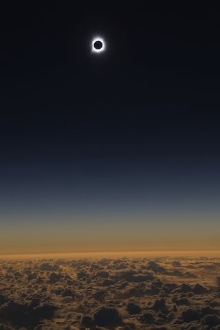 In 2016, a total solar eclipse — seen here from Alaska Airlines Flight 870 — began at 23:19 UTC on March 8 and reached its maximum point at 01:59 UTC on March 9, with totality lasting 4 minutes and 9 seconds.