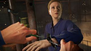 Best VR games - Blood and Truth screnshot of the player picking a handcuff lock to free a blonde woman from her shackles