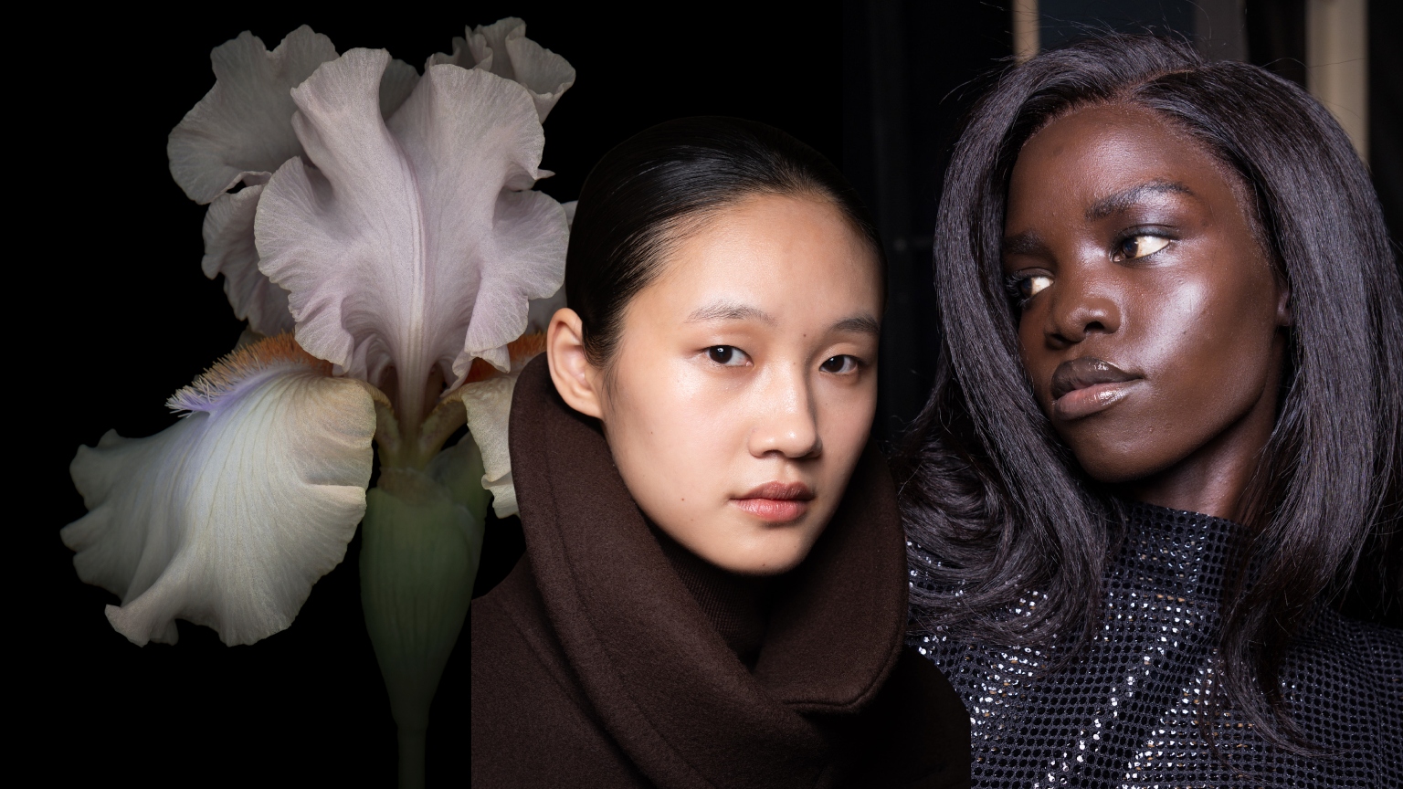 two women with glowing skin on a dark background with a white flower