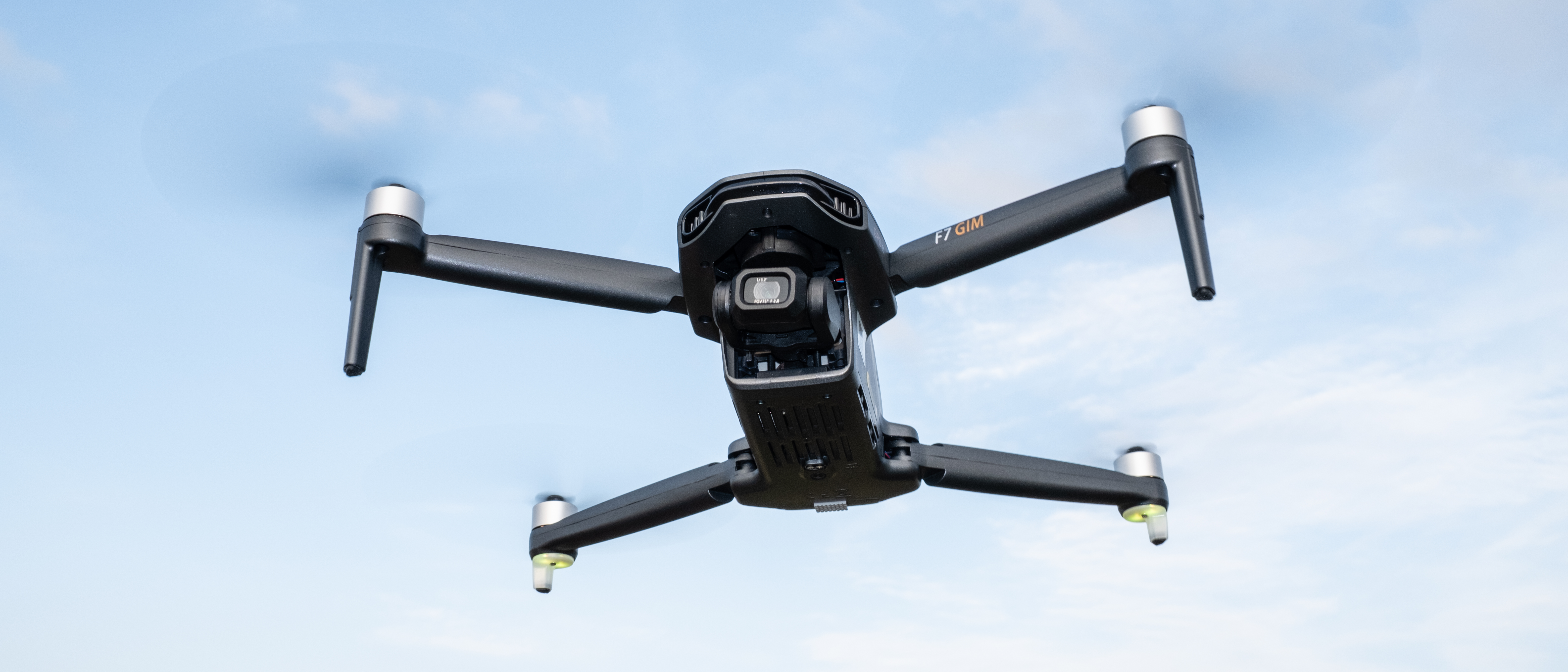 Bwine F7GIM in flight against a blue sky