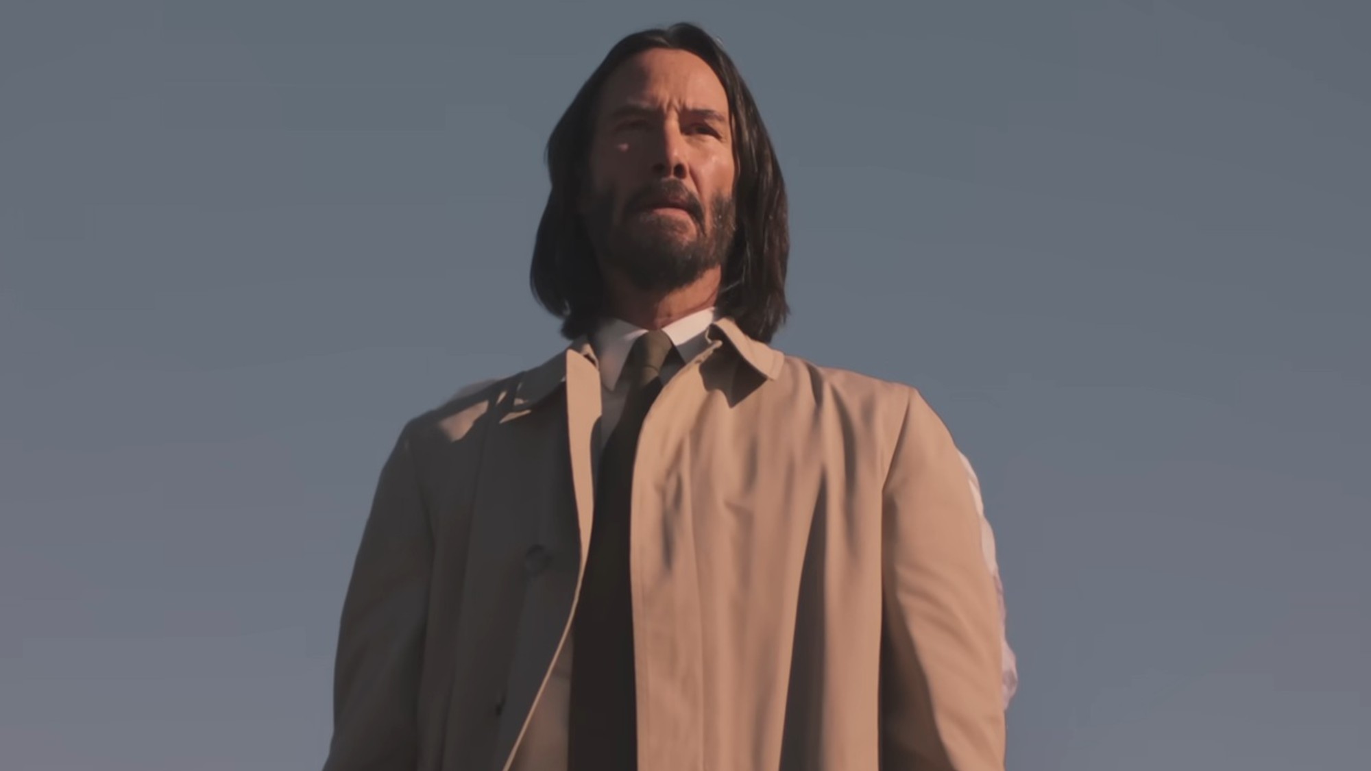 Keanu Reeves standing majestically up high in Good Fortune
