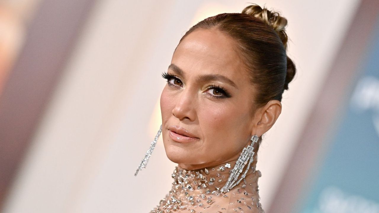 jennifer lopez on a beige background