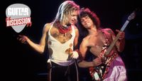 David Lee Roth (left) and Eddie Van Halen perform onstage at the International Amphitheater in Chicago, Illinois on October 11, 1981