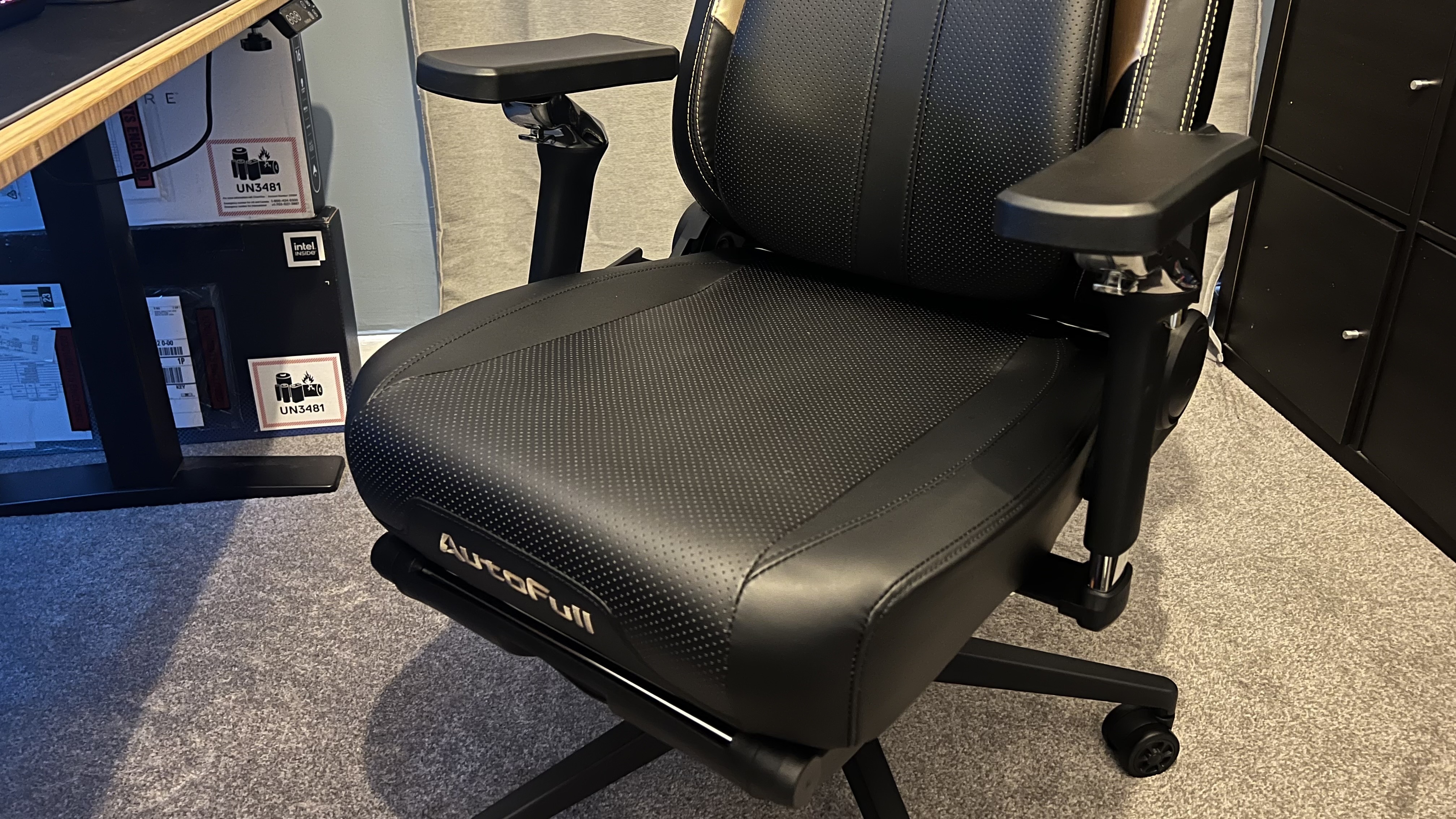Seat base of Autofull M6 Ultra 2.0 gaming chair showing perforated holes