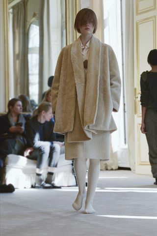 a model walks The Row winter 2025 runway during Paris Fashion Week