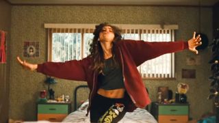 Zendaya wearing a maroon hoodie in Euphoria season 2