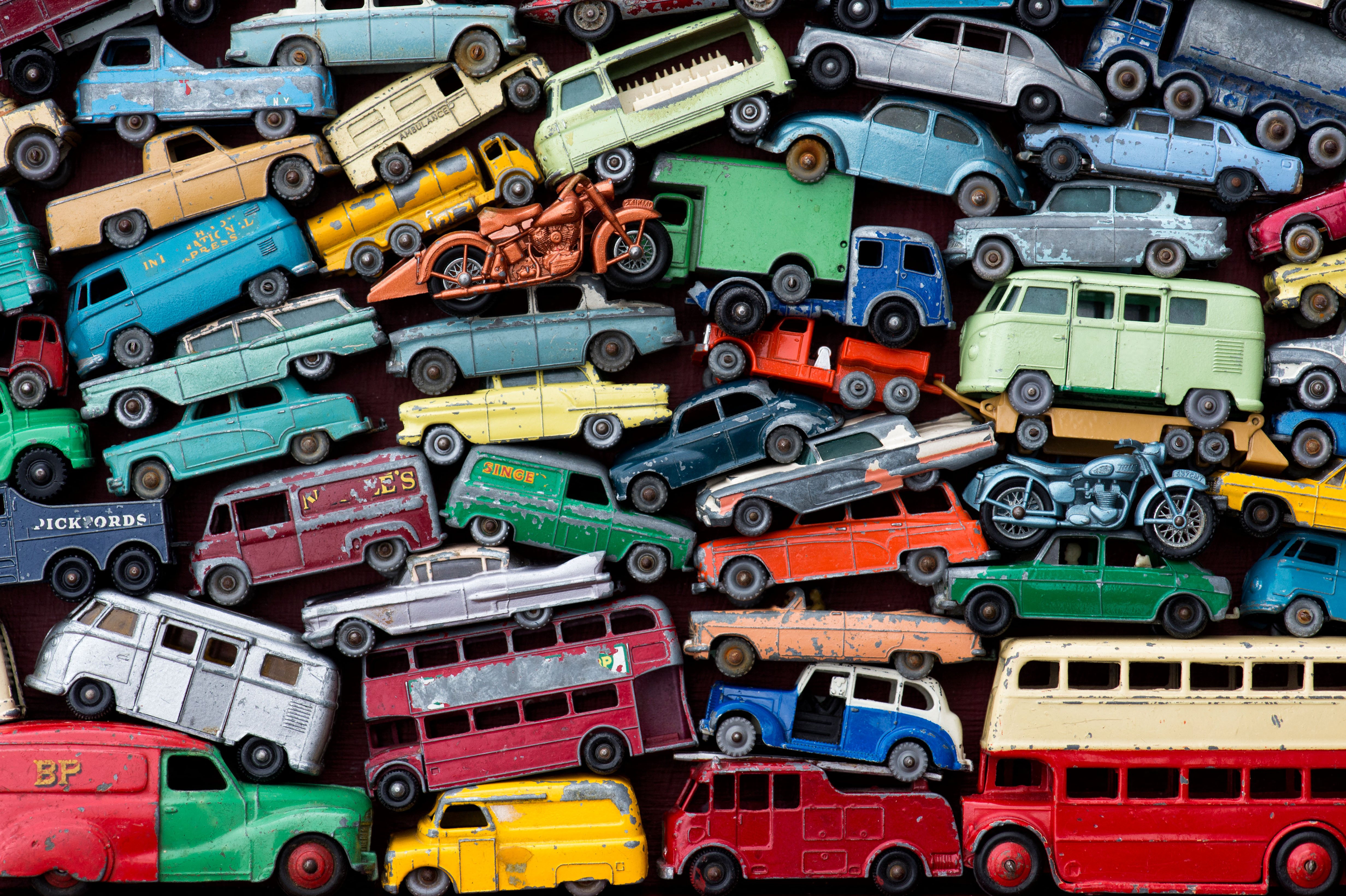 Old playworn Dinky, Matchbox Lesney toy cars, buses, motorbikes pattern