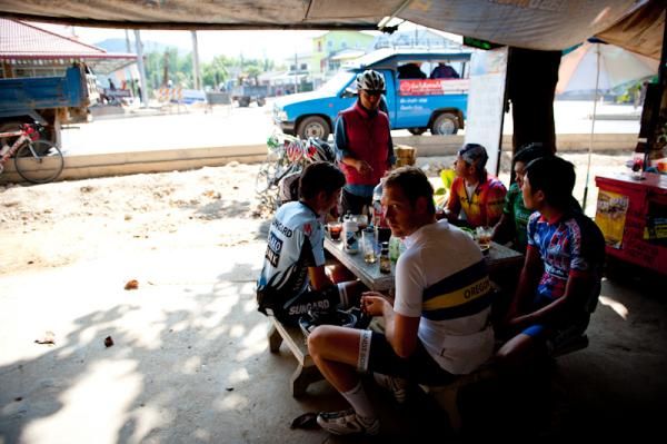 Riders take a rest in a small grocery store
