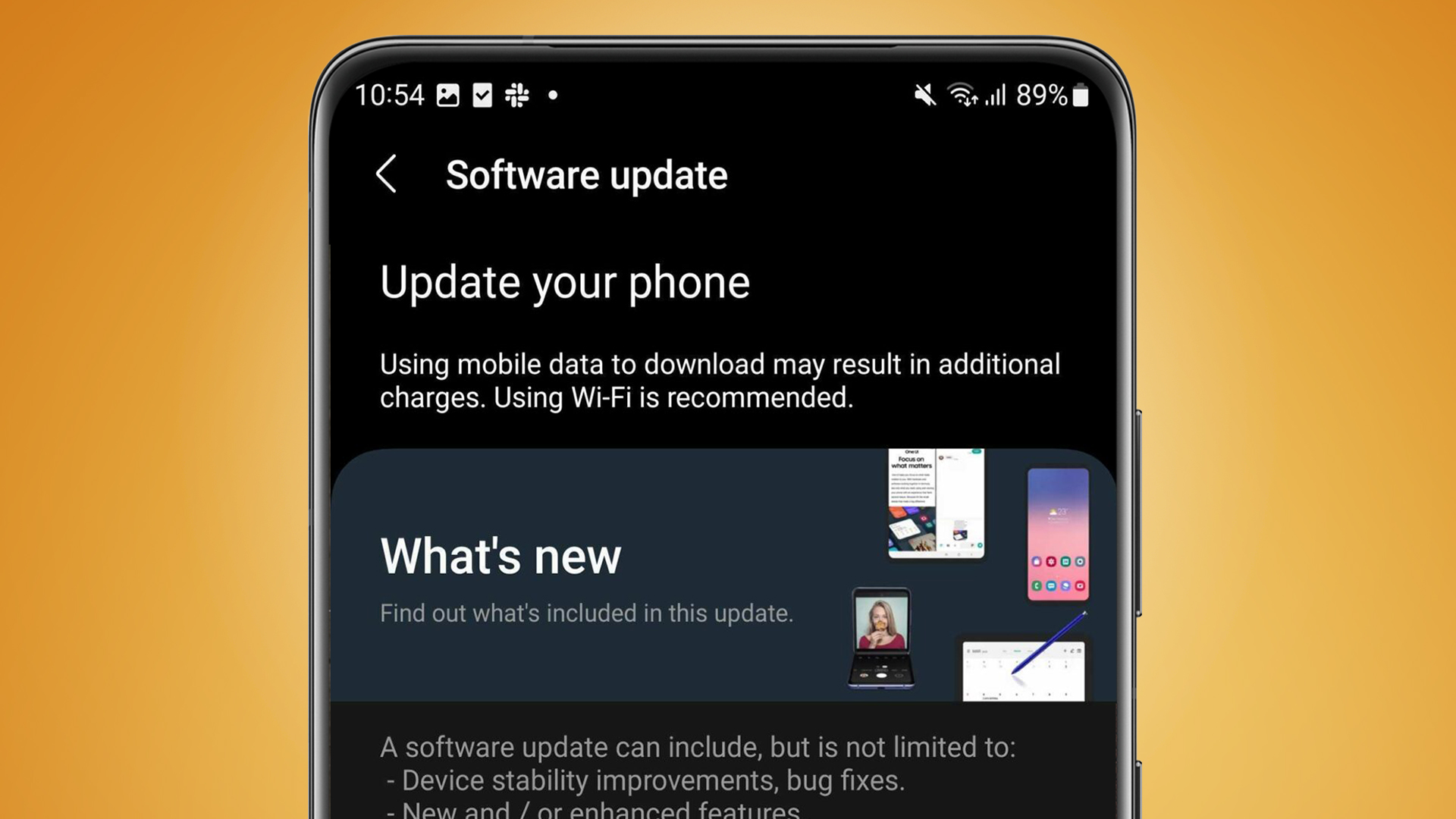 A Samsung phone on an orange background showing a software update being installed