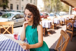 Beautiful single woman at a restaurant.