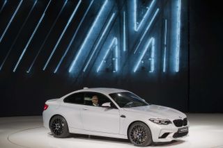 The new BMW M2 competiton is presented during a press conference at the Beijing Auto Show in Beijing on April 25, 2018. - Global carmakers touted their latest electric and SUV models in Beiji
