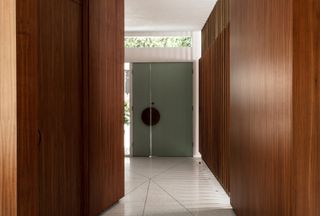 inside, looking towards the main entrance at cove way, a midcentury home restored by Sophie goineau
